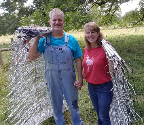 John and Kirsten Robertson with netting
